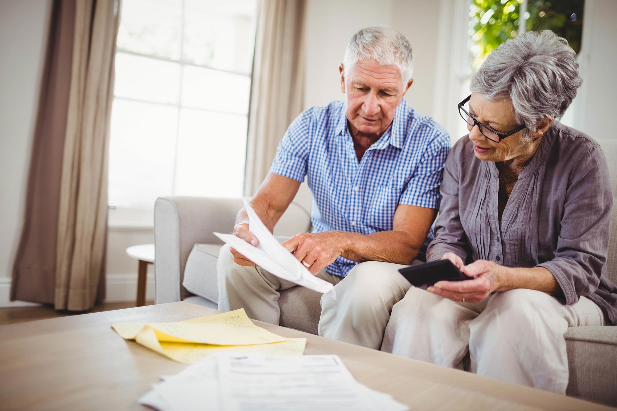 Older couple reviewing documents
