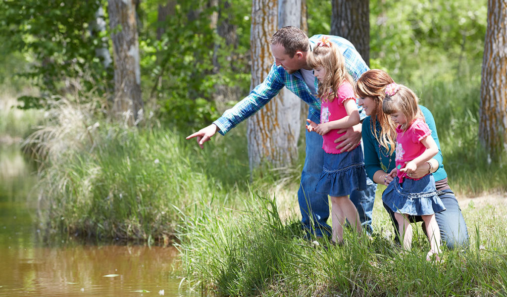 Catholic United Members by a lake