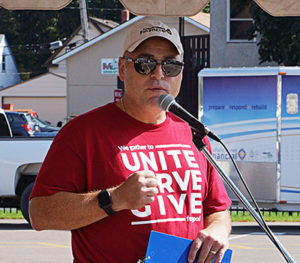 Sr. Vice President Michael Ahles speaks to volunteers at the Gather4Good event in Columbia Heights, MN in 2019