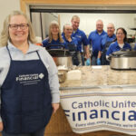 Impact team serving dinner at a church